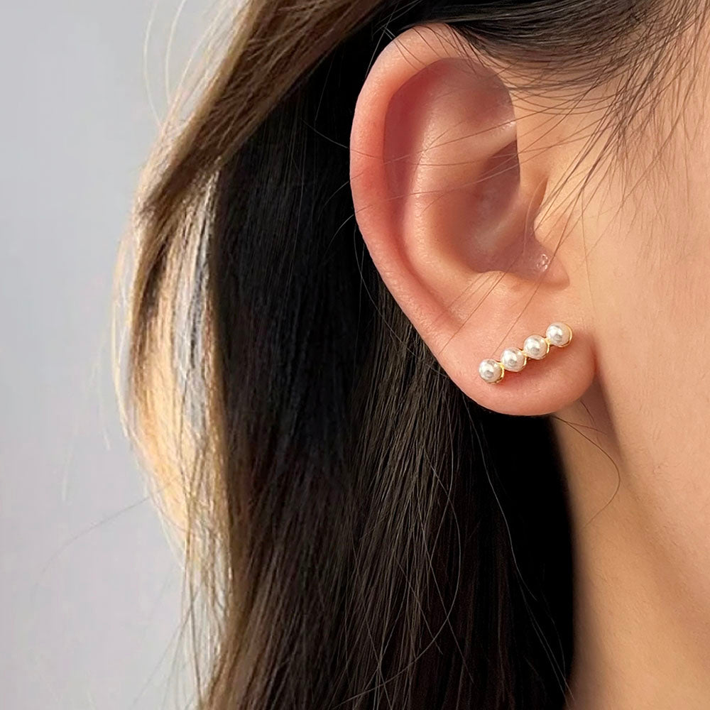 Mira Golden Pearl Bar Studs